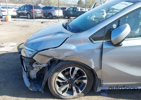 2018 Honda Odyssey Elite z USA, uszkodzony, nr VIN 5FNRL6H91JB070355